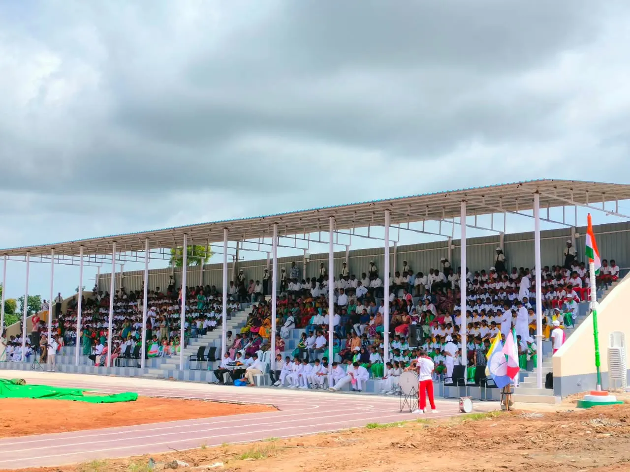 John's Academy amphitheatre packed with students and families at a school event